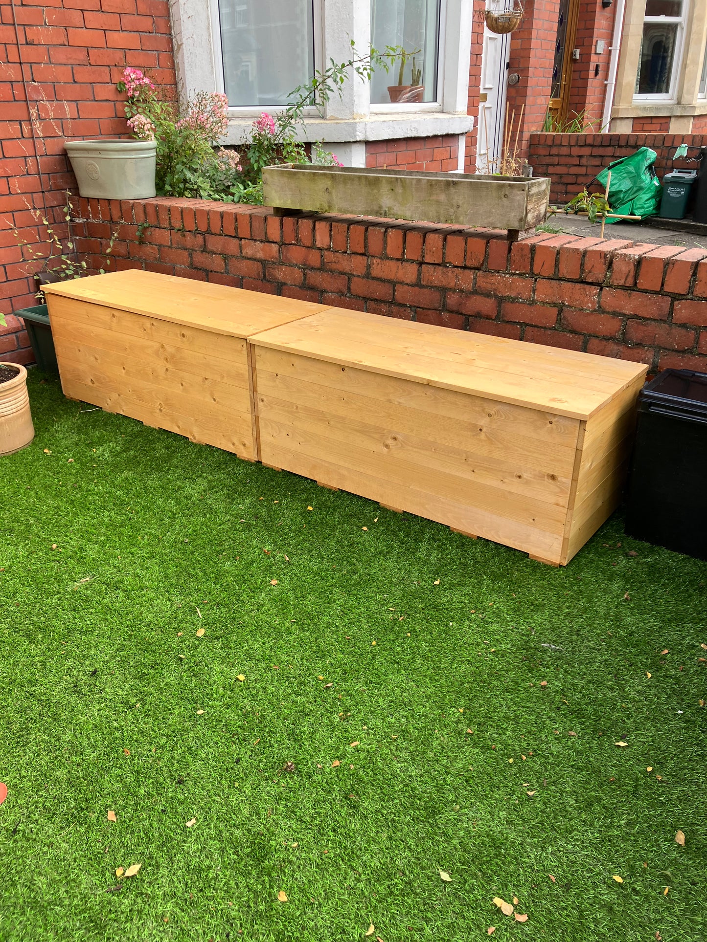 Two Solid Recycling Storage Benches